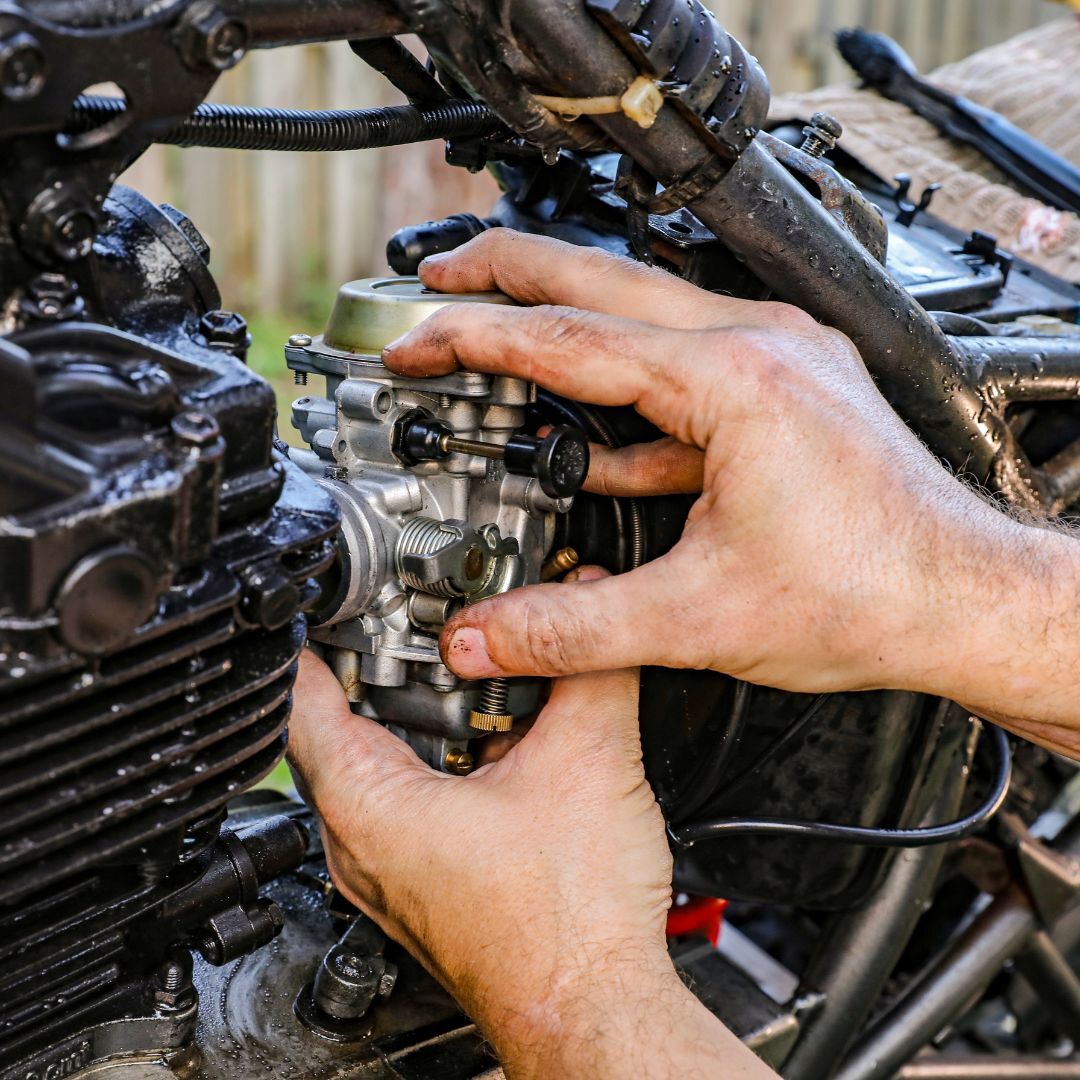 working on a motorcycle engine